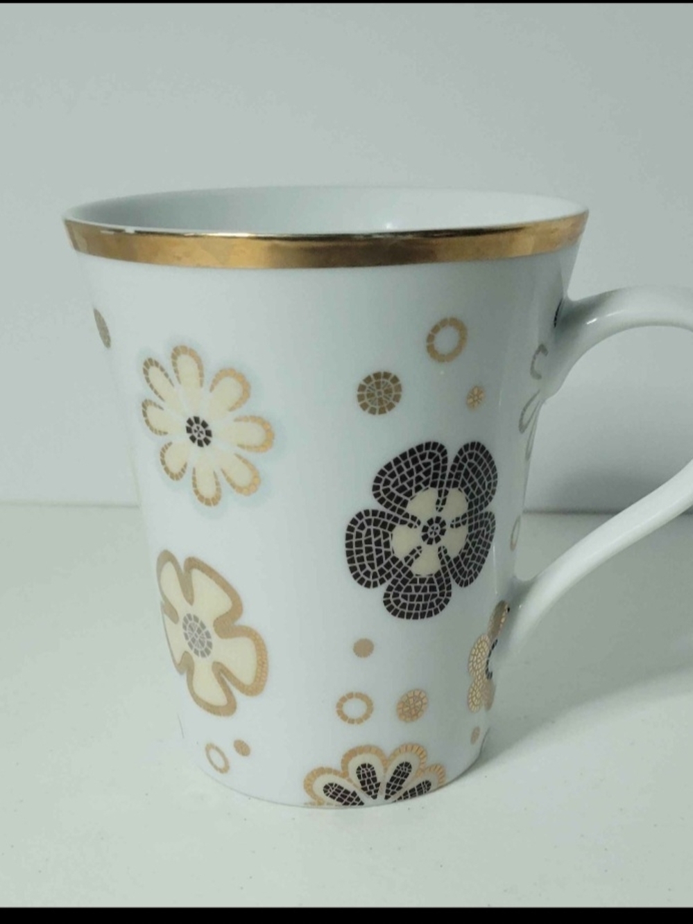 Encore Jeans White Mug with Gold and Black Floral Accents